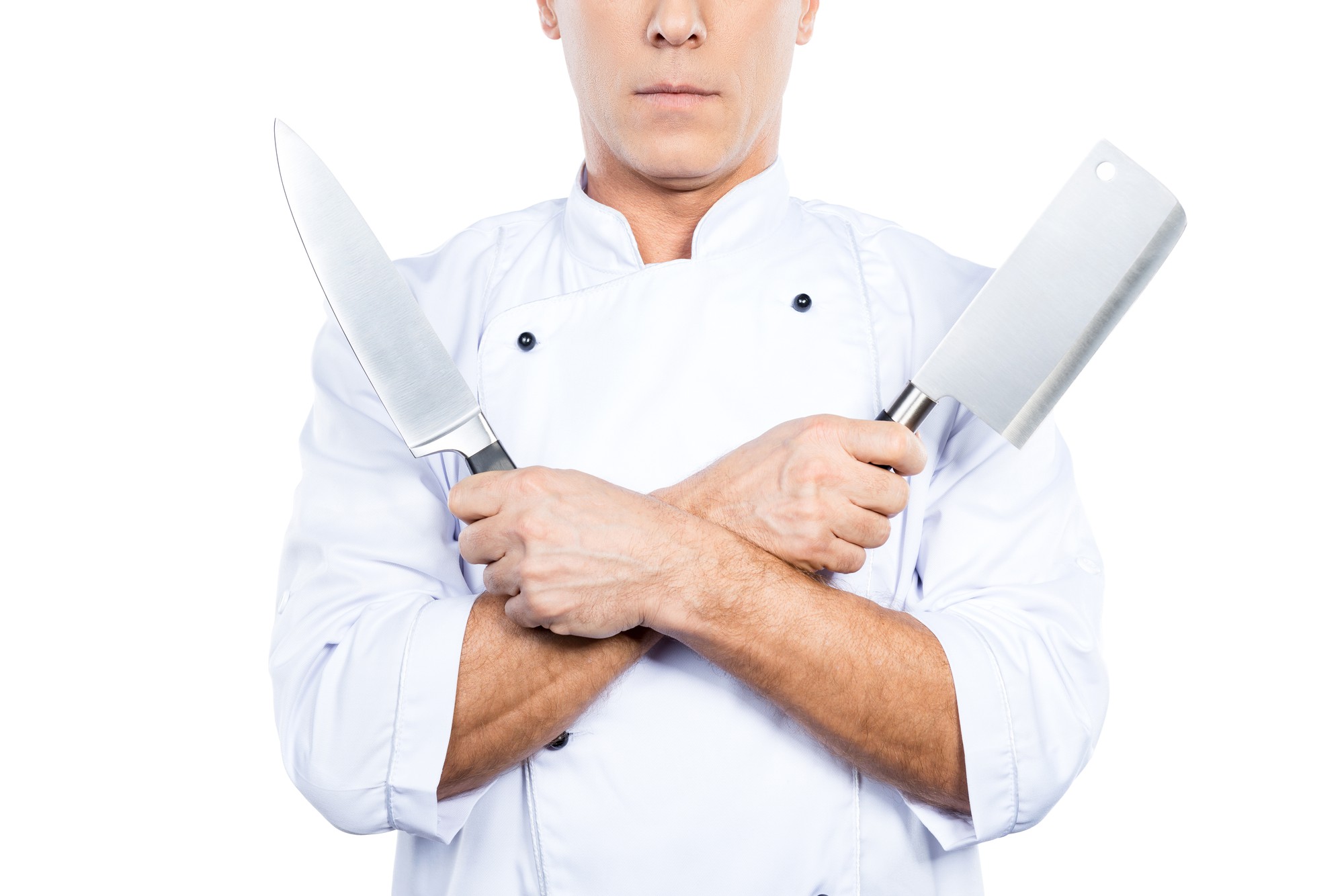 Chef mostrando una tecnica di taglio
